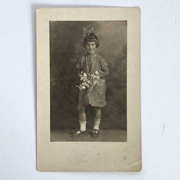 RPPC 1920s Young Swiss Girl Holding Flowers Bouquet Real Photo Postcard - Picture 2 of 5